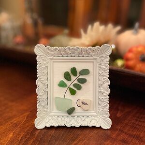 Elegant Sea Glass Art with White Frame, Green Plant and Cup of Tea!